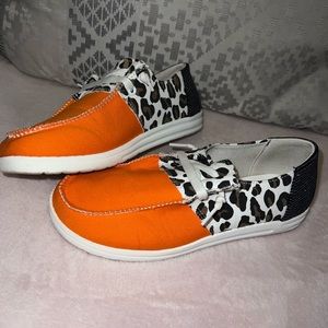 Orange, cheetah print & sparkly black slip ons.